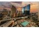 Cityscape with view of the resort pool, multiple buildings, and amenities at 135 E Harmon Ave # 407, Las Vegas, NV 89109