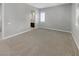Large bedroom with carpet and a view of the ensuite bath at 3408 Isle Dr, Las Vegas, NV 89141