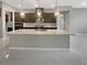 Modern kitchen featuring a large island, stainless steel appliances, and pendant lighting at 3408 Isle Dr, Las Vegas, NV 89141