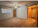Bright bedroom with carpet, ceiling fan and walk-in closet at 4140 Gannet Cir # 251, Las Vegas, NV 89103