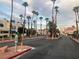 Gated community entrance with palm trees at 4140 Gannet Cir # 251, Las Vegas, NV 89103