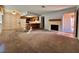 Open concept kitchen and living area with fireplace at 4140 Gannet Cir # 251, Las Vegas, NV 89103