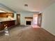 Living room with fireplace and patio access at 4140 Gannet Cir # 251, Las Vegas, NV 89103