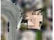 Aerial view of the roof and landscaping of the home and the surrounding street at 6019 Orca Lilly St, North Las Vegas, NV 89031