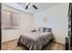 Bedroom with a double bed, window with blinds, and neutral walls at 6019 Orca Lilly St, North Las Vegas, NV 89031