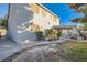 Exterior view of the backyard, covered patio, and the home at 6019 Orca Lilly St, North Las Vegas, NV 89031