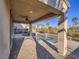 Spacious covered patio overlooking the pool and golf course at 1090 Via Pareda Pl, Henderson, NV 89011