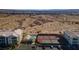 Aerial shot features a swimming pool, tennis courts, and parking areas nestled between condo buildings at 3550 Bay Sands Dr # 2076, Laughlin, NV 89029
