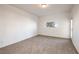 A large bedroom with carpet flooring and a large window at 3550 Bay Sands Dr # 2076, Laughlin, NV 89029