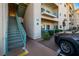 Condo building entrance with stairs, unit number 10, and manicured landscaping for a welcoming feel at 3550 Bay Sands Dr # 2076, Laughlin, NV 89029