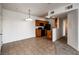 Open concept kitchen featuring dark appliances, wood cabinets, and breakfast bar, perfect for entertaining at 3550 Bay Sands Dr # 2076, Laughlin, NV 89029