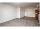 Comfortable living space open to the kitchen, featuring neutral carpet and tile flooring for a seamless transition at 3550 Bay Sands Dr # 2076, Laughlin, NV 89029