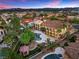 Luxury home with a large pool and beautifully landscaped backyard, offering stunning views at 5079 Mountain Top Cir, Las Vegas, NV 89148