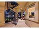 Elegant balcony with spiral staircase and seating area overlooking a scenic view at 5079 Mountain Top Cir, Las Vegas, NV 89148