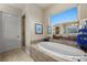 Luxurious bathroom with soaking tub, separate shower, and modern fixtures at 5079 Mountain Top Cir, Las Vegas, NV 89148