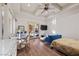 Multipurpose bedroom with a sitting area and access to a patio at 5079 Mountain Top Cir, Las Vegas, NV 89148