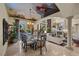 Bright dining room with a painted ceiling, chandelier, and seating for six at 5079 Mountain Top Cir, Las Vegas, NV 89148