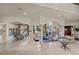 Open living and dining area with high ceilings and marble floors at 5079 Mountain Top Cir, Las Vegas, NV 89148