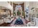 Spacious living room with high ceilings, chandelier and fireplace at 5079 Mountain Top Cir, Las Vegas, NV 89148