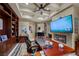 Home office with built-in bookshelves and a fireplace at 5079 Mountain Top Cir, Las Vegas, NV 89148