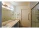 Double vanity bathroom with large shower and ample storage at 5467 Morning Swim Ln, Las Vegas, NV 89113