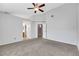 Large main bedroom with carpet flooring and ceiling fan at 686 Covina Dr, Henderson, NV 89002