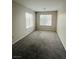 Bright bedroom with carpet flooring and large windows at 1509 Blanco Dr, North Las Vegas, NV 89031