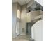 Two-story entryway with tile floors and an open staircase at 1509 Blanco Dr, North Las Vegas, NV 89031