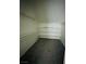 Large walk-in closet with shelves and hanging rods at 1509 Blanco Dr, North Las Vegas, NV 89031