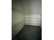 Spacious walk-in closet with shelves and hanging rods at 1509 Blanco Dr, North Las Vegas, NV 89031