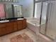 Spacious bathroom with double sinks, soaking tub, and shower at 1531 Singing Bird Ln, North Las Vegas, NV 89031