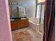 Bathroom features double sinks, garden tub, and shower stall at 1531 Singing Bird Ln, North Las Vegas, NV 89031
