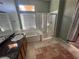 Bathroom boasts a jetted tub and walk-in shower at 1531 Singing Bird Ln, North Las Vegas, NV 89031
