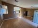 Bright living room features hardwood floors, neutral walls, and an open floor plan at 1531 Singing Bird Ln, North Las Vegas, NV 89031