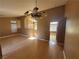 Large living room with hardwood floors, vaulted ceiling, and a chandelier at 1531 Singing Bird Ln, North Las Vegas, NV 89031