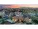 Expansive property with panoramic city views, a lake, and a well-manicured landscape, perfect for luxurious living at 2870 Quartz Canyon Dr, Henderson, NV 89052