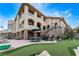 Backyard with patio, putting green, and comfortable seating, ideal for outdoor gatherings at 2870 Quartz Canyon Dr, Henderson, NV 89052