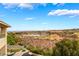 Expansive backyard view of golf course, water feature, and inviting outdoor space at 2870 Quartz Canyon Dr, Henderson, NV 89052