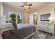 Bedroom with large window and decorative dresser at 2870 Quartz Canyon Dr, Henderson, NV 89052