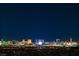 Stunning nighttime view of the illuminated city skyline at 2870 Quartz Canyon Dr, Henderson, NV 89052