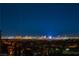 Breathtaking city skyline view at night, with the city lights illuminating the darkness, creating a stunning backdrop at 2870 Quartz Canyon Dr, Henderson, NV 89052