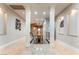 Hallway with marble floors, recessed lighting, decorative columns and accents, and a view of the front door at 2870 Quartz Canyon Dr, Henderson, NV 89052