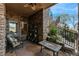 Covered outdoor patio offering a comfortable seating area and scenic views of the surrounding landscape at 2870 Quartz Canyon Dr, Henderson, NV 89052
