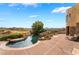 Gorgeous pool with a serene view of the lake and golf course, blending relaxation with scenic beauty at 2870 Quartz Canyon Dr, Henderson, NV 89052