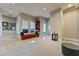 Bright sitting area features custom bench seating and travertine floors at 2870 Quartz Canyon Dr, Henderson, NV 89052
