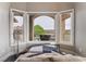 Sitting area with cozy furnishings and large windows that display a breathtaking view of the exterior at 2870 Quartz Canyon Dr, Henderson, NV 89052