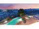 Resort-style swimming pool with rock features and spa overlooking the evening landscape at 2870 Quartz Canyon Dr, Henderson, NV 89052