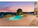 Inviting backyard pool with rock accents and comfortable lounge seating, set against a scenic backdrop at 2870 Quartz Canyon Dr, Henderson, NV 89052
