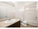 Clean bathroom with a bathtub, toilet, and vanity at 5017 Aesop Ave, Las Vegas, NV 89139