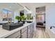 Bathroom boasts dual sinks, soaking tub, and adjoins the main bedroom at 5873 Skyfall Ct, Las Vegas, NV 89135